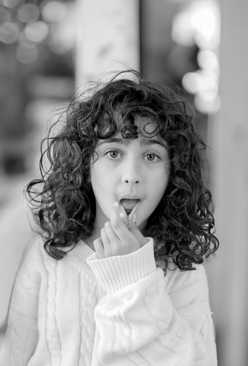 young girl making face at camera